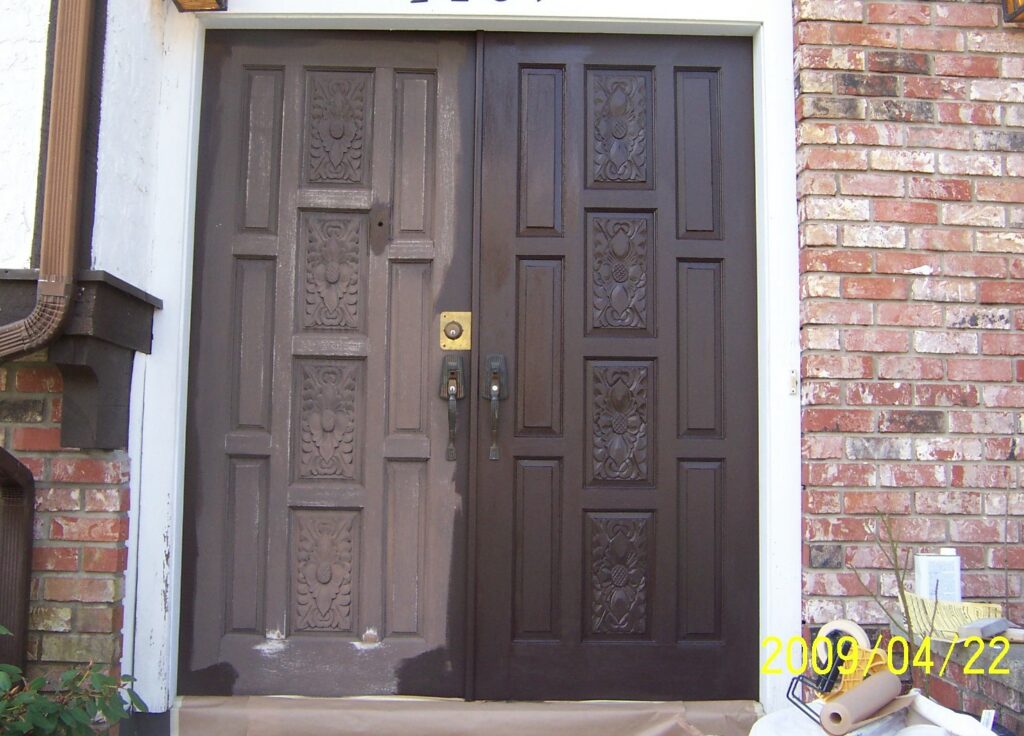 Wooden front door from the 1980's. It has been hand sanded and brushed with premium exterior acrylic house paint in a satin finish.