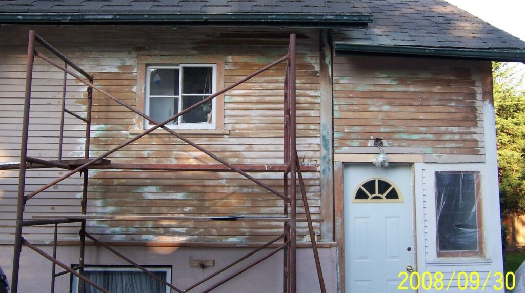 This pictures shows the results of stripping paint from old cedar siding. 95% of the old paint is gone after power sanding. Mostly bare wood is present and ready for primer.